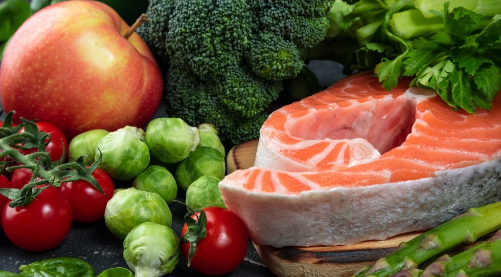 Healthy food. Selection of healthy food fish, vegetables, antioxidants and sources of omega 3